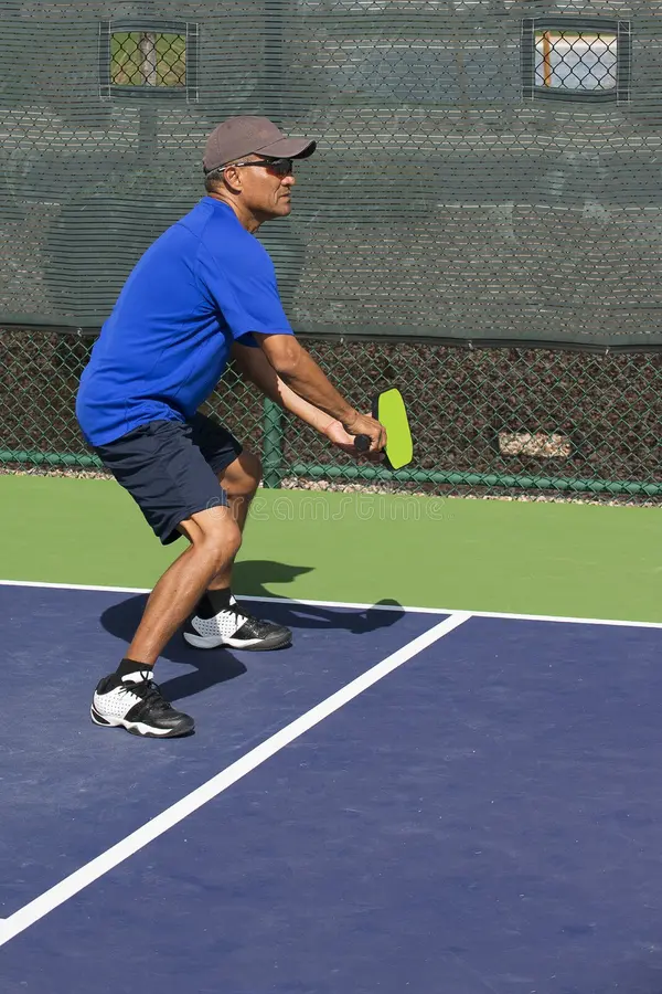 Man preparing for pickleball